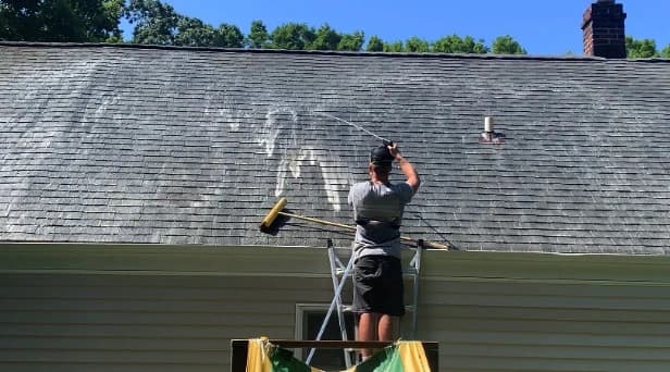 Before and after results of roof washing by Barberton Power Washing in Barberton